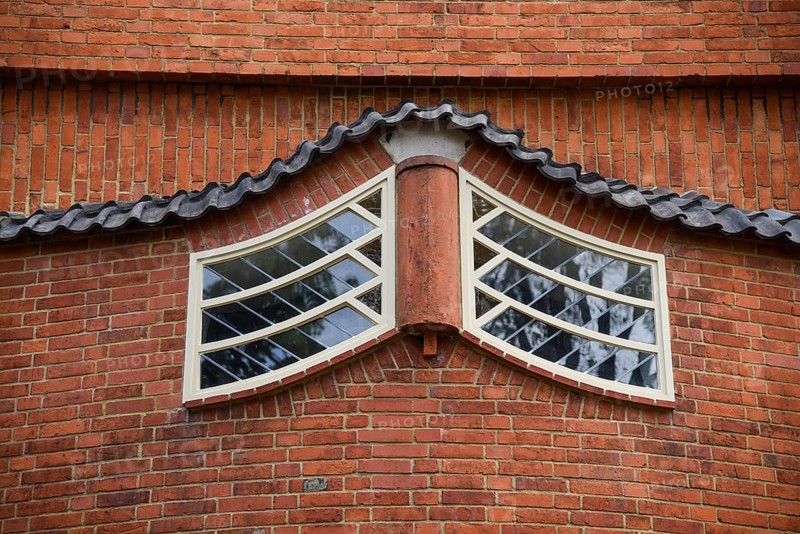 Amsterdam, Netherlands. June 2022. View of the facades of the characteristic brick building of residential complex with Amsterdam School style architecture