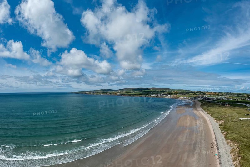 An aerial panorama view of the Bray Head cliffs and headland on Valentia Island at sunset aerial view of the endless golden sand beach in Ballybunion on the west coast of Ireland