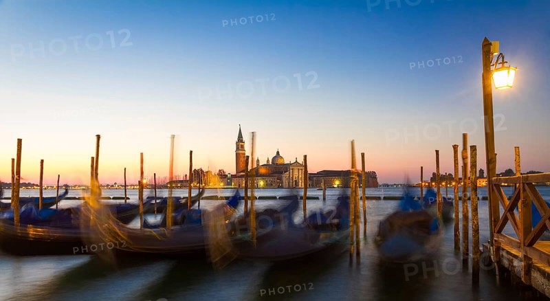 Gondolas at sunrise with San Giorgio di Maggiore church, Venice, Venezia, Italy