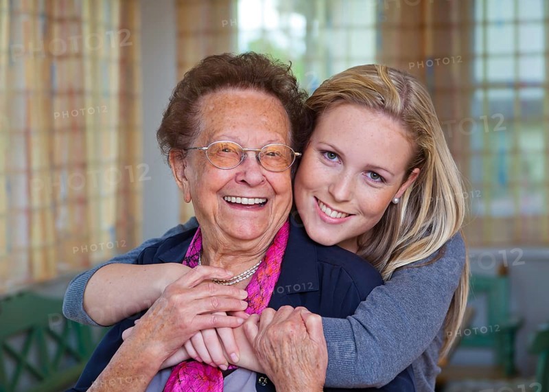 A grandson visits his grandmother Fun and joy during the hug. Austria