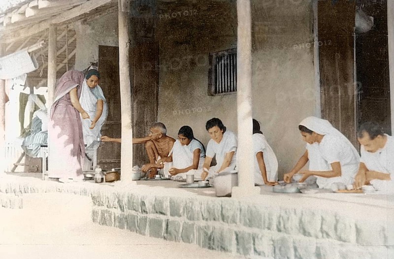 Mahatma Gandhi and others taking dinner Sevagram Ashram, Wardha, India, Asia, November 1933