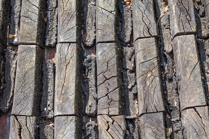 Detail of an old wooden gearwheel