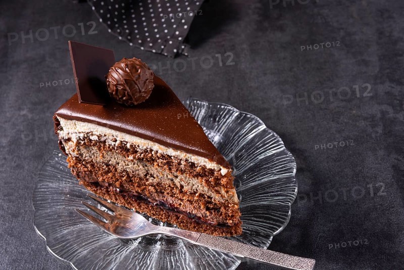 Chocolate cake Airy biscuits and a cream of cream and chocolate
