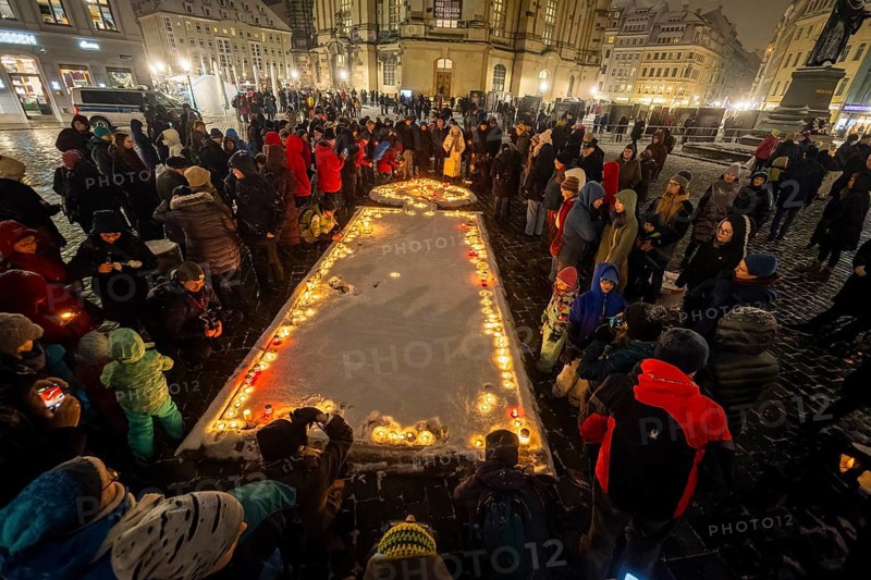 On 13 and 14 February 1945, Dresden was heavily destroyed in three Allied bombing raids. Every year, the people of Dresden commemorate this event at various events. A long human chain symbolises the protection of the city centre. Candles are placed in front of the Church of Our Lady, Dresden, Saxony, Germany