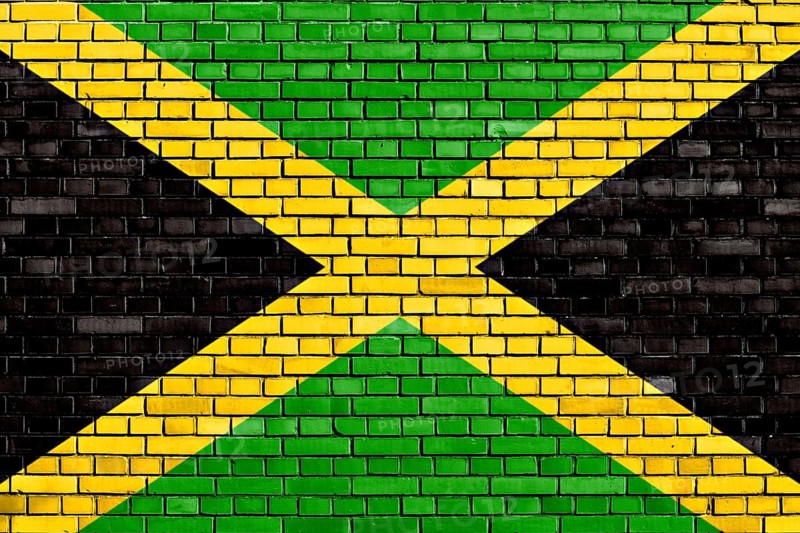 Flag of Jamaica painted on brick wall