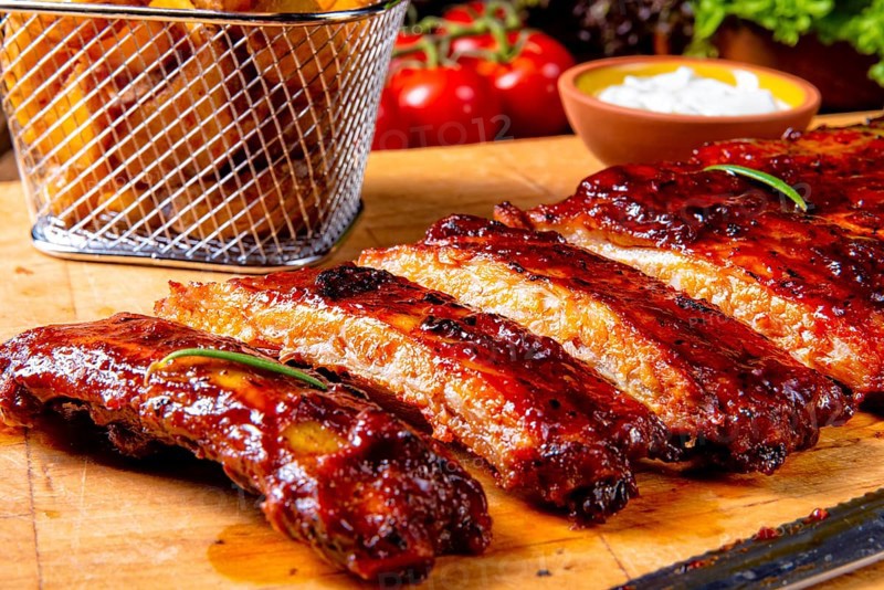 BBQ spare ribs from a charcoal grill