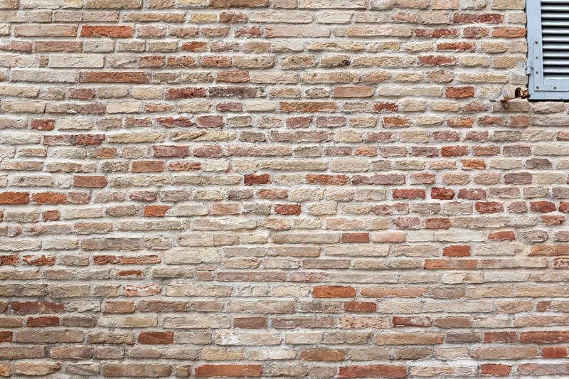 An image of a typical red brick wall background texture
