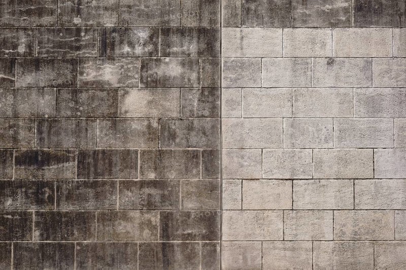 Weathering and water residue have washed out to form a striking pattern on a wall