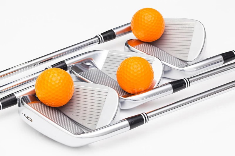 Titanium golf clubs on the white background