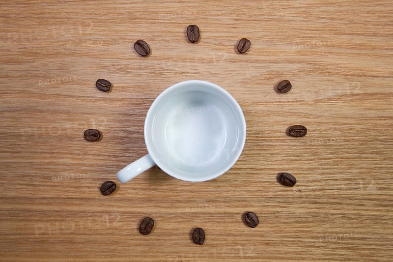 Coffee Time - Empty coffee cup and clock of coffee beans