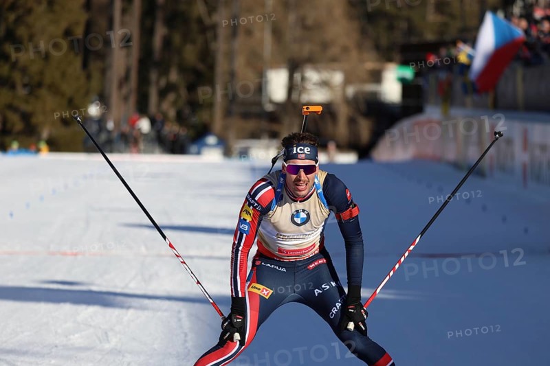 Sturla Holm Laegreid (Norway/NOR) crossing the finish line in the sprint at the IBU Biathlon World Championships Lenzerheide 2025, Lenzerheide, Switzerland / SUI / CH
