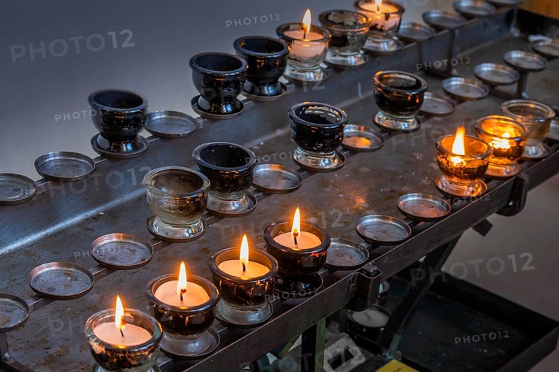 Sacrificial lights in the Catholic parish church of St Blasius in Dietmannsried, Allgäu, Bavaria, Germany