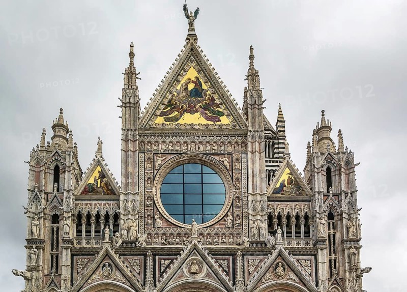 Main facade of Siena Cathedral (Duomo di Siena) is a medieval church in Siena, Italy. The cathedral itself was originally designed and completed between 1215 and 1263