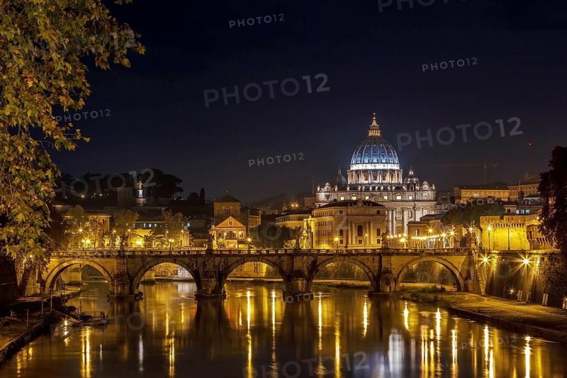 View of Ponte Vittorio Emanuele II and St. Peter's Basilica in evening, Rome