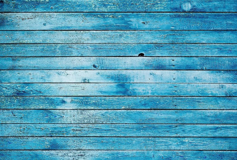 Old blue dirty wooden wall. High quality image, great for backgrounds and modern grunge designs
