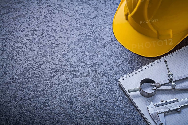 Notebook hard hat divider vernier scale copyspace construction concept