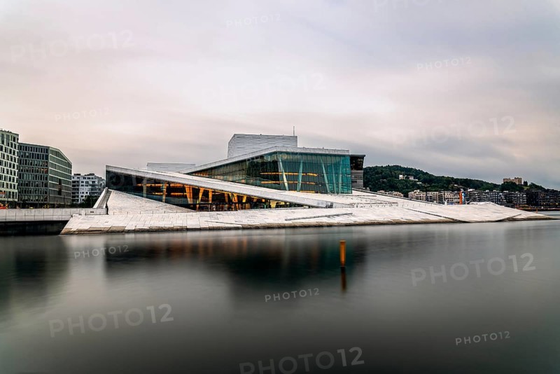 Oslo, Norway, August 10, 2019: Exterior view of Opera house in Oslo. Long exposure at dusk. New modern building designed by Snohetta architects. It is the National Theater of Opera and Ballet of Norway