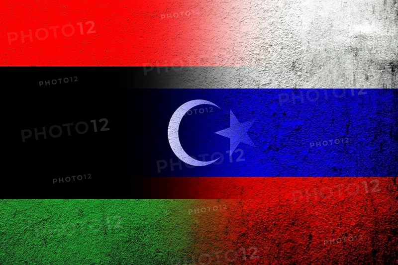 National flag of Russian Federation with The State of Libya National flag. Grunge background