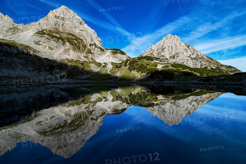 Panorama of the Drachensee, the Coburger Hütte and the Zugspitze in Tyrol, Austria, Alps