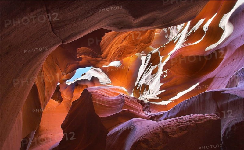 Shone orange and violet colors a canyon of Antelope in the USA in a bright sunny day
