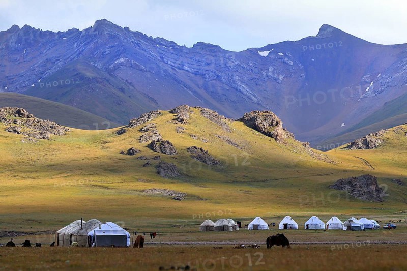 Yurt camp and high mountains at Lake Songköl (Son Kul, Song Kol), Kyrgyzstan