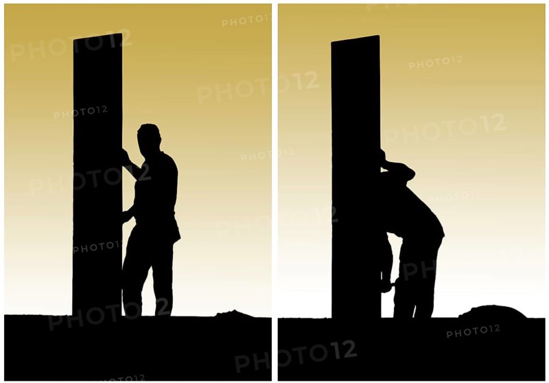 Construction workers work on building site
