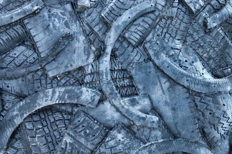 Dump background of old tires. cut automotive rubber chemical industry