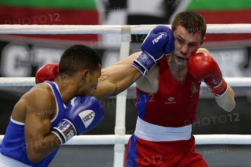 Sofia, Bulgaria. 27th February, 2021. Dorin Bucsa (red) of Moldova and Havier Ibanes of Bulgaria fight in their final round of Feather (57kg) category of the 72-nd International Boxing T ournament Strandja 2021, Sofia, Bulgaria