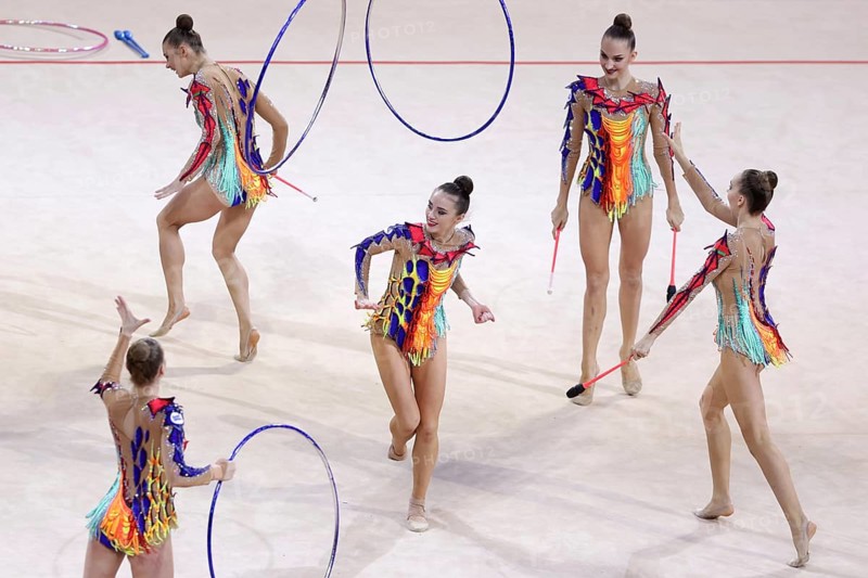 Sofia, Bulgaria - 27 March, 2021: Team Belarus perform during the 3 Hoops + 2 pairs of Clubs group qualifications at the 2021 Rhythmic Gymnastics Sofia World Cup, Sofia, Bulgaria