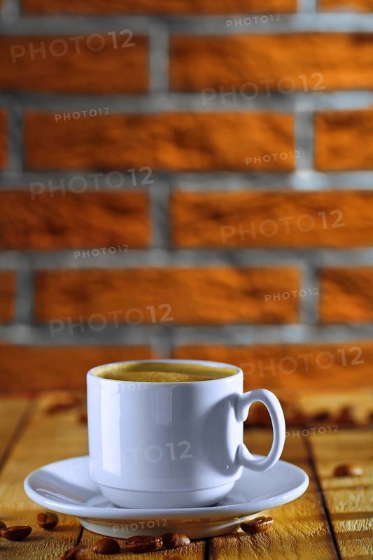 White cup with coffee