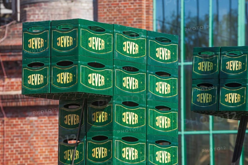 Stacked Jever beer crates in front of the Frisian Brewery, Jever Brewery, Jever, East Frisia, Lower Saxony, Germany
