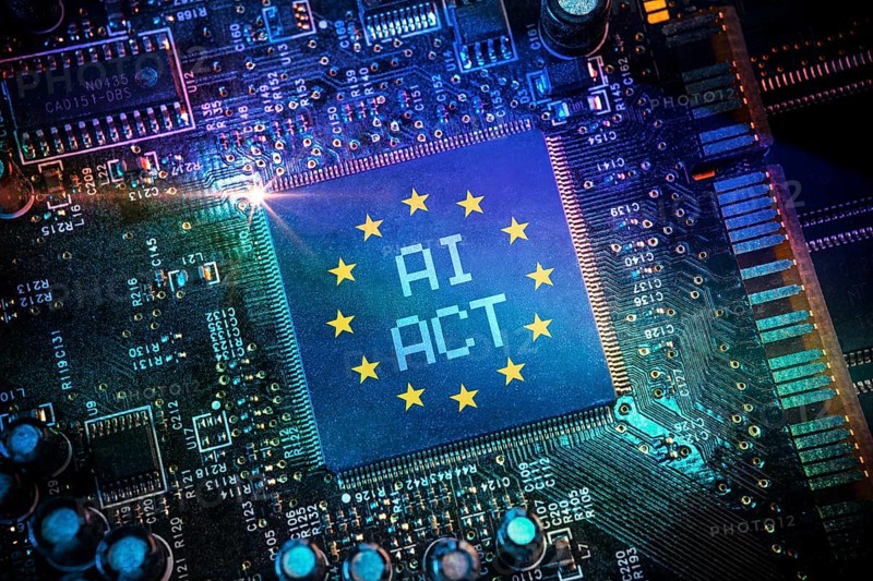 Computer chip with European flag and inscription AI Act, AI regulation, photomontage