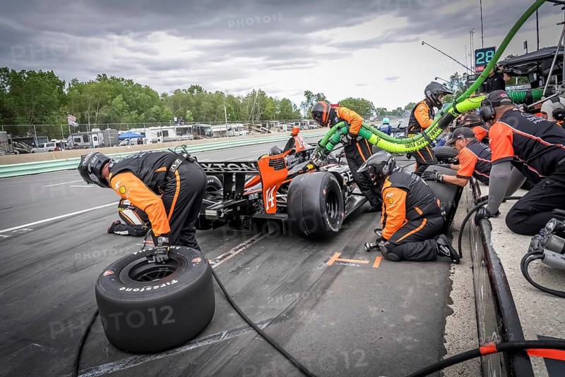 SANTINO FERRUCCI (14) of Woodbury, Connecticut comes down pit road for service during the XPEL Grand Prix at Road America in Elkhart Lake, WI