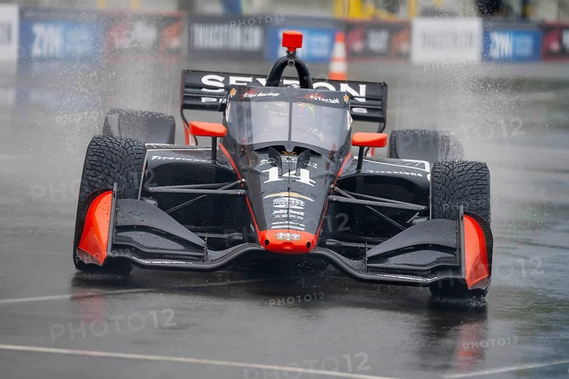 INDYCAR Series driver, SANTINO FERRUCCI (14) of Woodbury, Connecticut, travels through the turns during a wet and dangerous practice session for the Big Machine Music City Grand Prix at Streets of Nashville in Nashville TN
