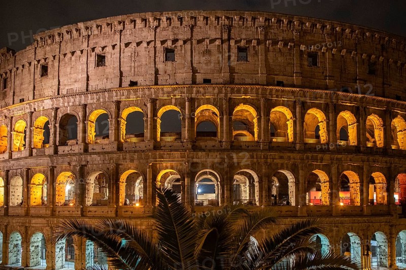 The Colosseum, famous and unique historical building of the Eternal City. View in the morning with great lighting, light installation. no people, Rome, Italy