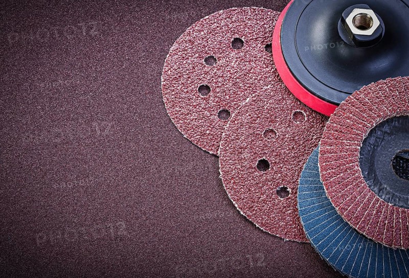 Sanding discs holder on polishing sheet abrasive materials
