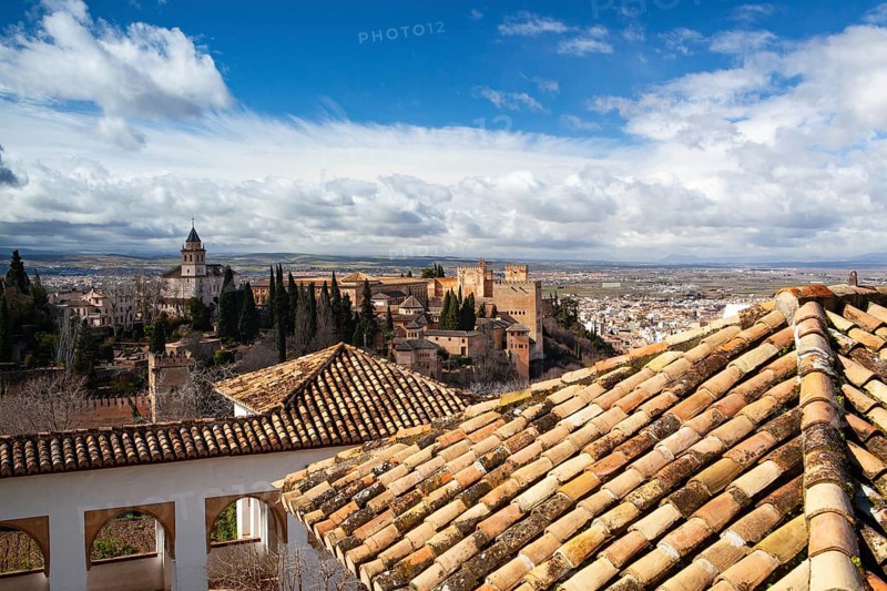 The Alhambra is a palace and fortress complex located in Granada, Andalusia, Spain. It was originally constructed as a small fortress in AD 889 on the remains of Roman fortifications