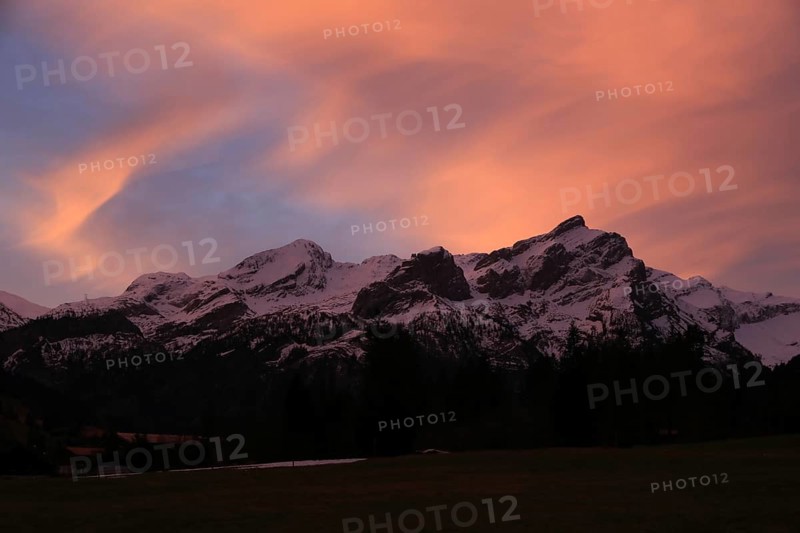 Sky on fire, sunrise scene in Gsteig near Gstaad