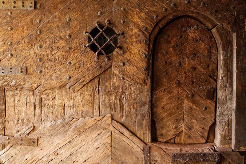 Castle gate with medieval wooden door