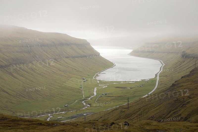 View towards Kollafjordur bay on the Faroe Islands as seen from the surrounding mountain, Faroe Islands, Denmark
