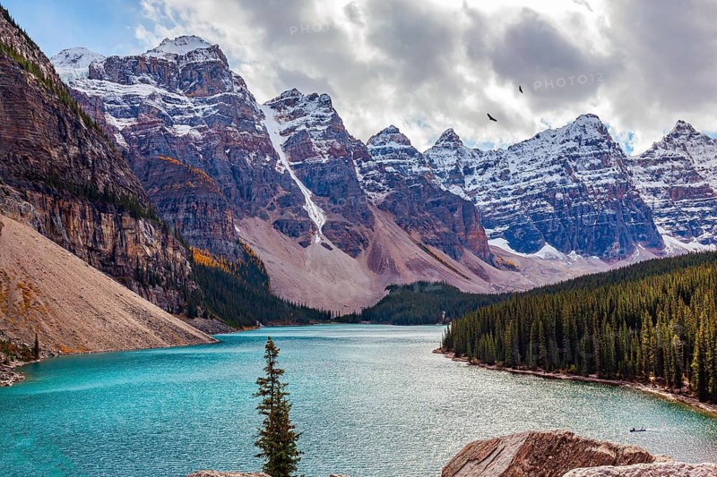 Canada. The most beautiful mountain lake Moraine. The picturesque valley of the Ten Peaks surrounds the magnificent lake. Mountains covered with snow