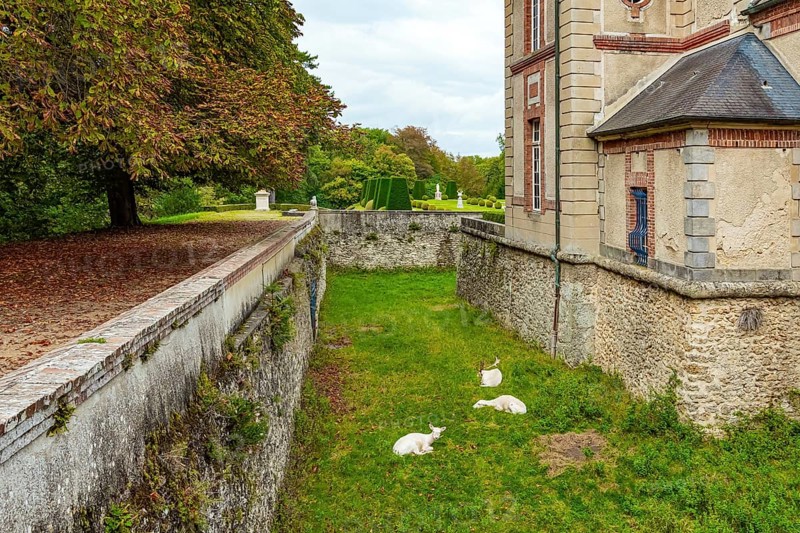 Castle of the noble family of Breteuil. Beautiful well-kept park surrounds the ancient castle of Breteuil. France