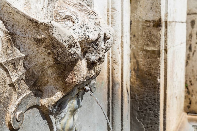 Detail of an ancient fountain in Spoleto Italy