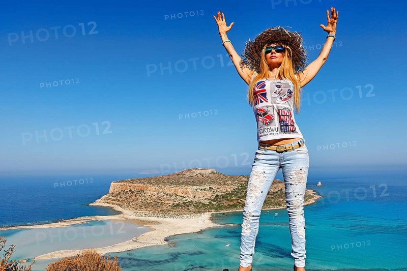 A beautiful woman over the beach Balos of Creta, Greece