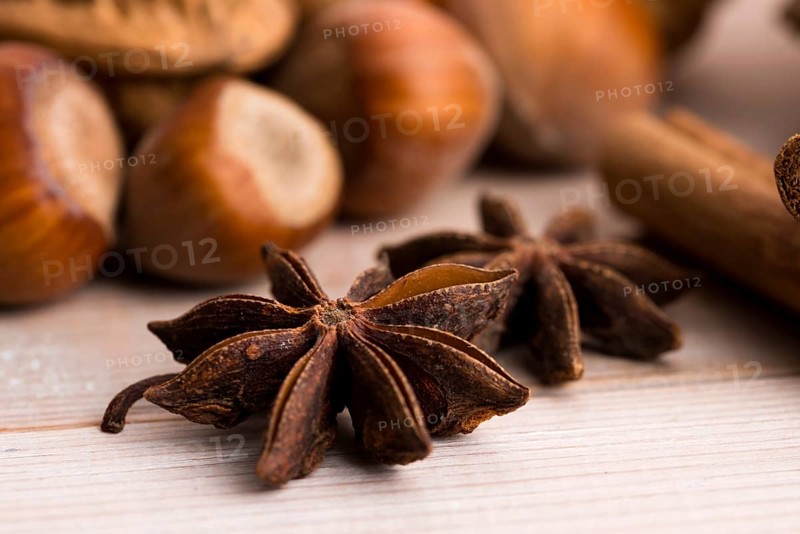 Different kinds of spices, nuts and dried oranges - christmas decoration, lodz, poland