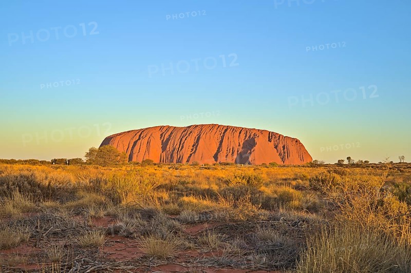 Ayers Rock or Uluru respectively at sun set. Photo shot in 2020