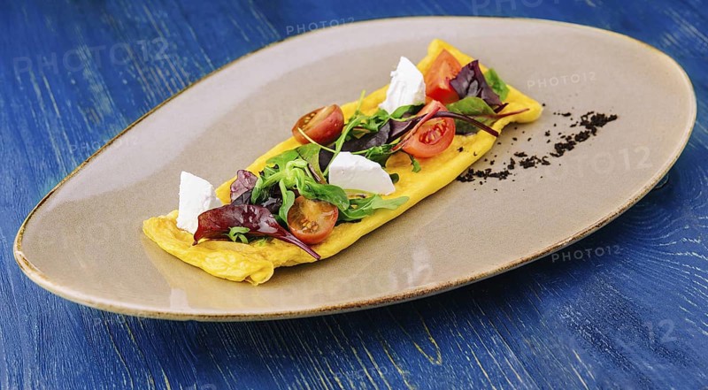 food still-life, Omelette with cherry tomatoes and goat cheese