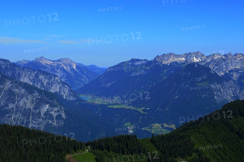 Paragliding above Spieljoch in the Zillertal valley viewing to the Inn valley