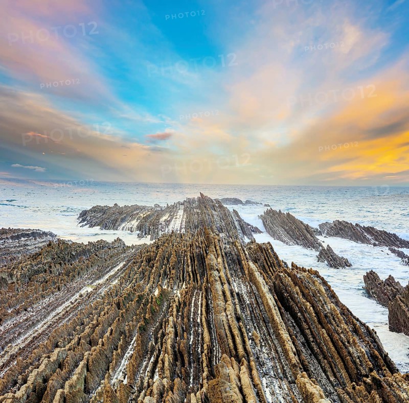 Magical unique landscape. Flysch - unique landscape of underwater rocks exposed at low tide. The most unusual beach in the Basque Country - Itsurun