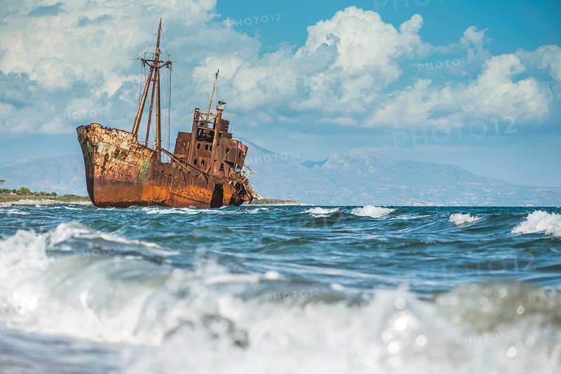 Old rustic big ship. Blue sky